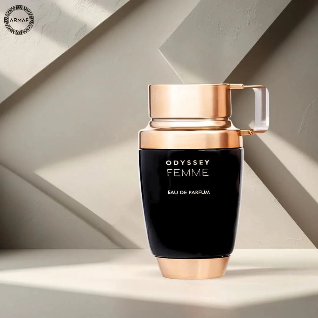 Odyssey Femme Eau de Parfum spray by Armaf, 100ml bottle, elegant glass packaging with floral design, feminine fragrance.