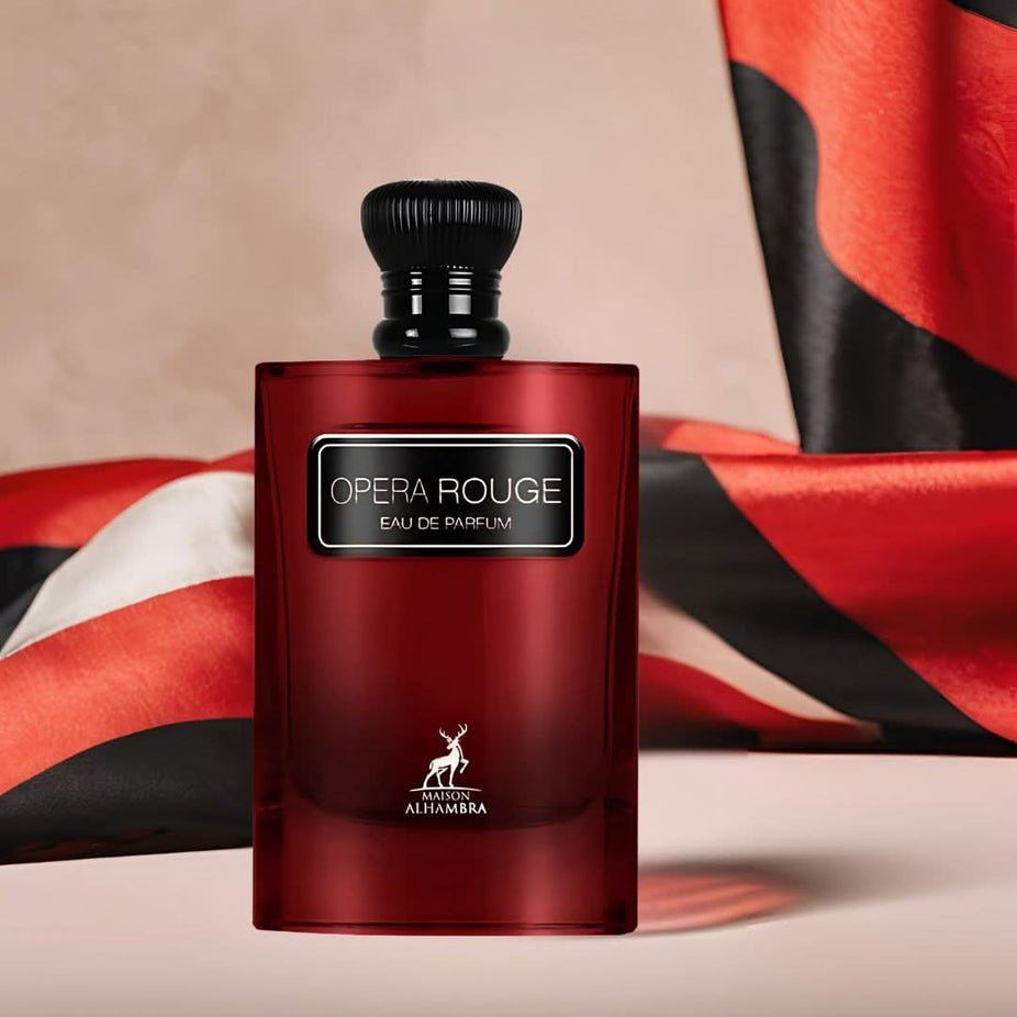 Maison Alhambra Opera Rouge Eau de Parfum spray bottle, 100ml, with elegant packaging and fragrance details visible.