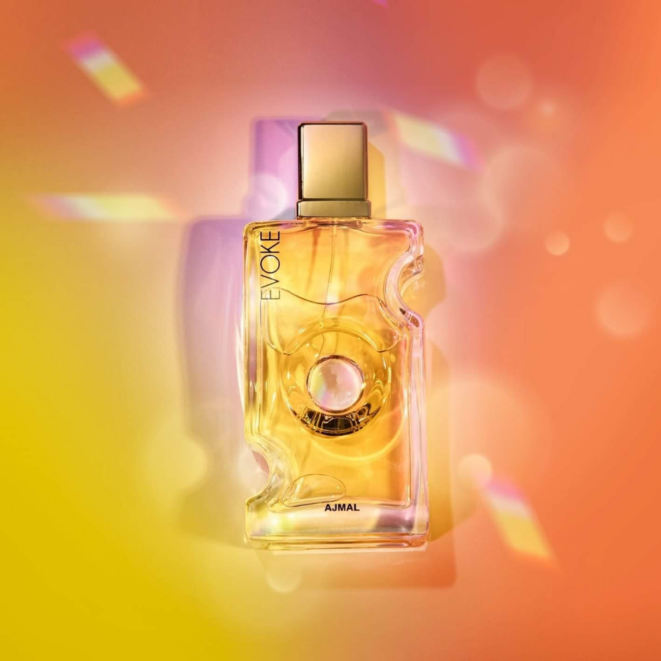 Evoke for Women Eau de Parfum by Ajmal, 75 ML bottle with floral and fruity notes, elegant perfume display.