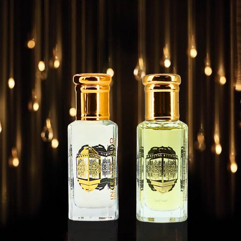 Intense Oud Rouje & Blush perfume oils bundle with black gift box, featuring two 12ml fragrance bottles in elegant packaging.