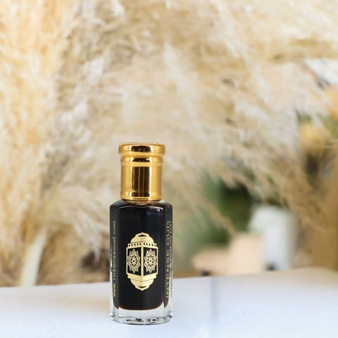 Pink Blush Eau de Parfum spray by Ard Al Zaafaran and Aphrodisiac Perfume Oil by Intense Oud in a bundle, featuring elegant bottles.