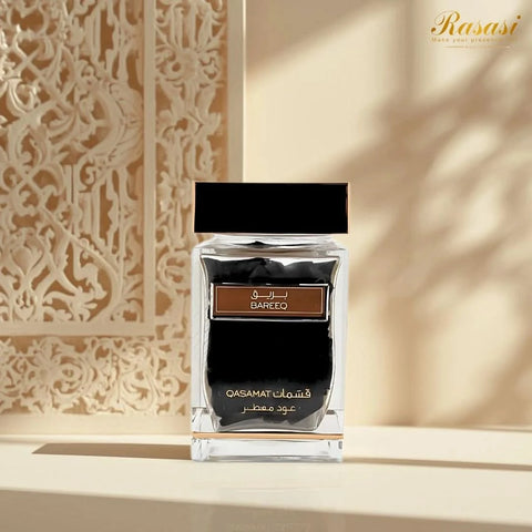 Rasasi Qasamat Bareeq Oudh Moattar Bakhoor 50g in a decorative container, showcasing traditional incense for home fragrance.