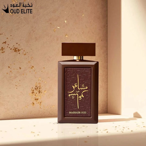 Mashaer Oud Eau de Parfum spray by Oud Elite, 100ml bottle with elegant design and gold accents on the cap.