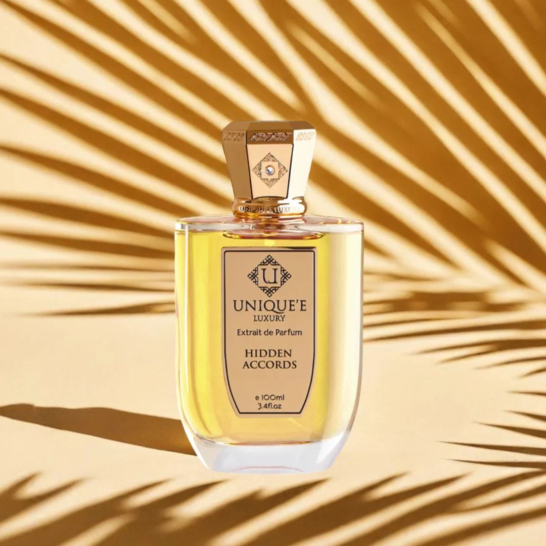 Unique'e Luxury Hidden Accords Extrait de Parfum 100ml EDP bottle with elegant packaging and minimalist design.