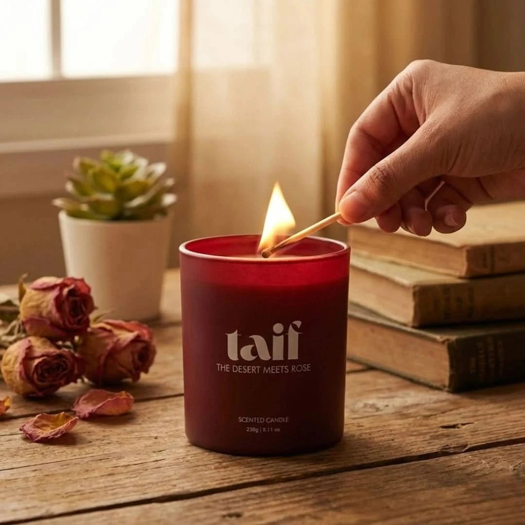 Intense Oud Taif Scented Candle with rose, oud, clove, vanilla, and amber notes, in a glass jar, 230g luxury home decor candle.