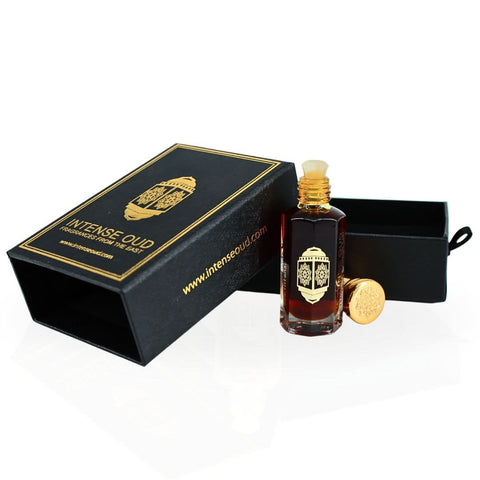 Intense Oud Mukhallat Al Zafran perfume oil in 12ml glass vial with black gift box, featuring luxurious Middle Eastern scent.