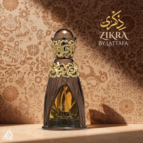 Lattafa Niche Emarati Zikra Eau de Parfum spray in a velvet pouch, 100ml, featuring elegant perfume bottle with floral and spicy notes