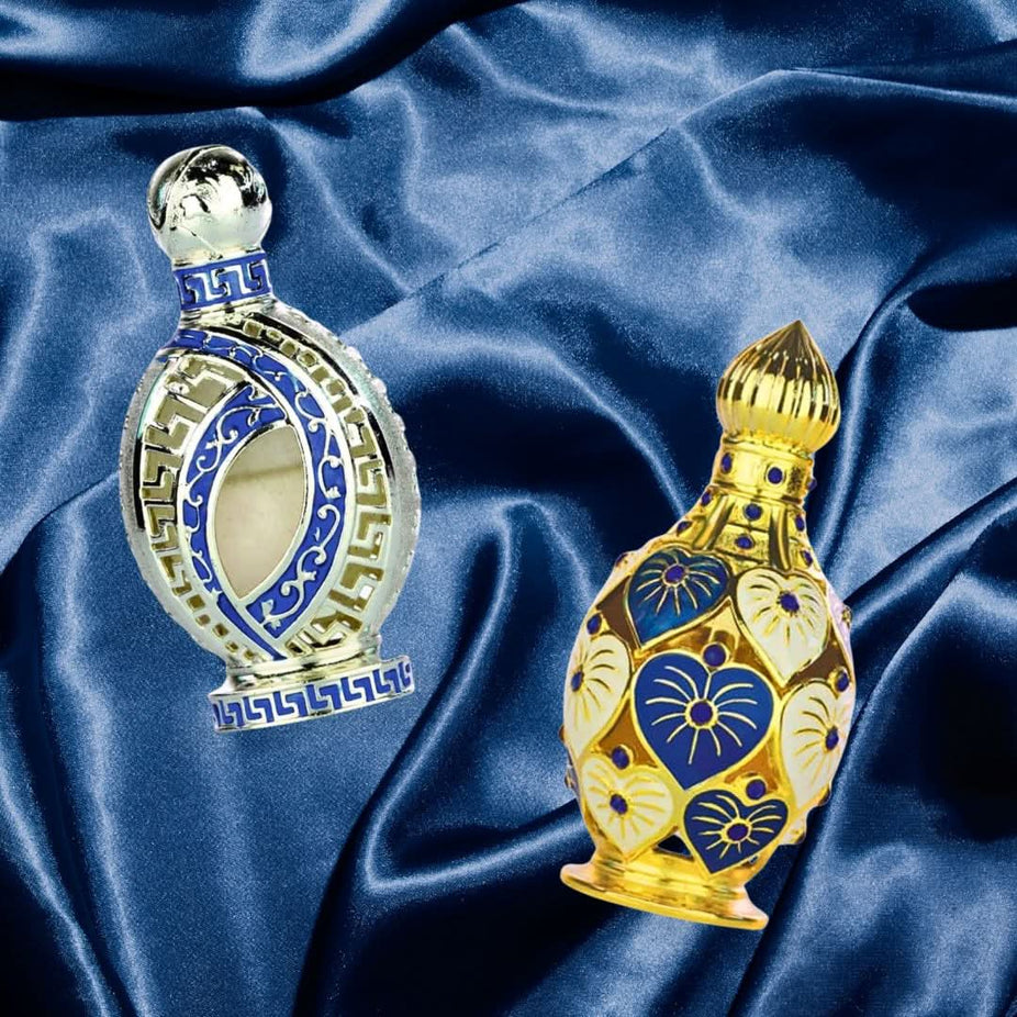 Hamidi Jawahir and Iqra perfume oils bundle showing five small glass bottles with ornate caps and labels.