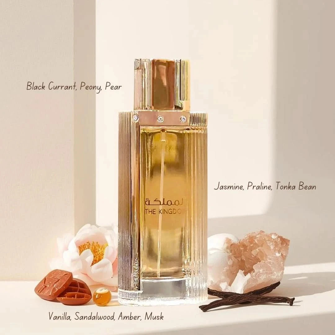 Lattafa The Kingdom for Women Eau de Parfum spray 100ml in a velvet pouch, featuring elegant perfume bottle design.