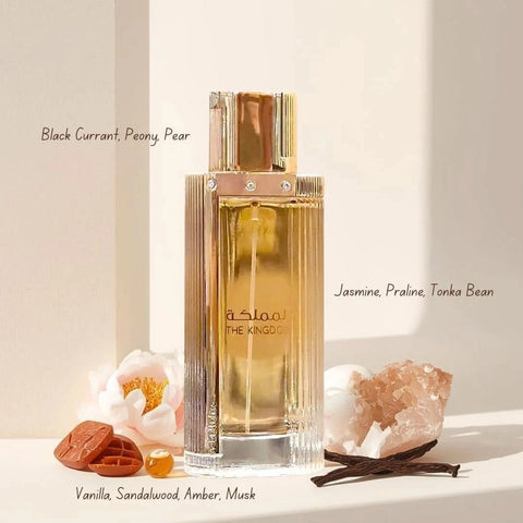Lattafa The Kingdom for Women Eau de Parfum spray 100ml in a velvet pouch, featuring elegant perfume bottle design.