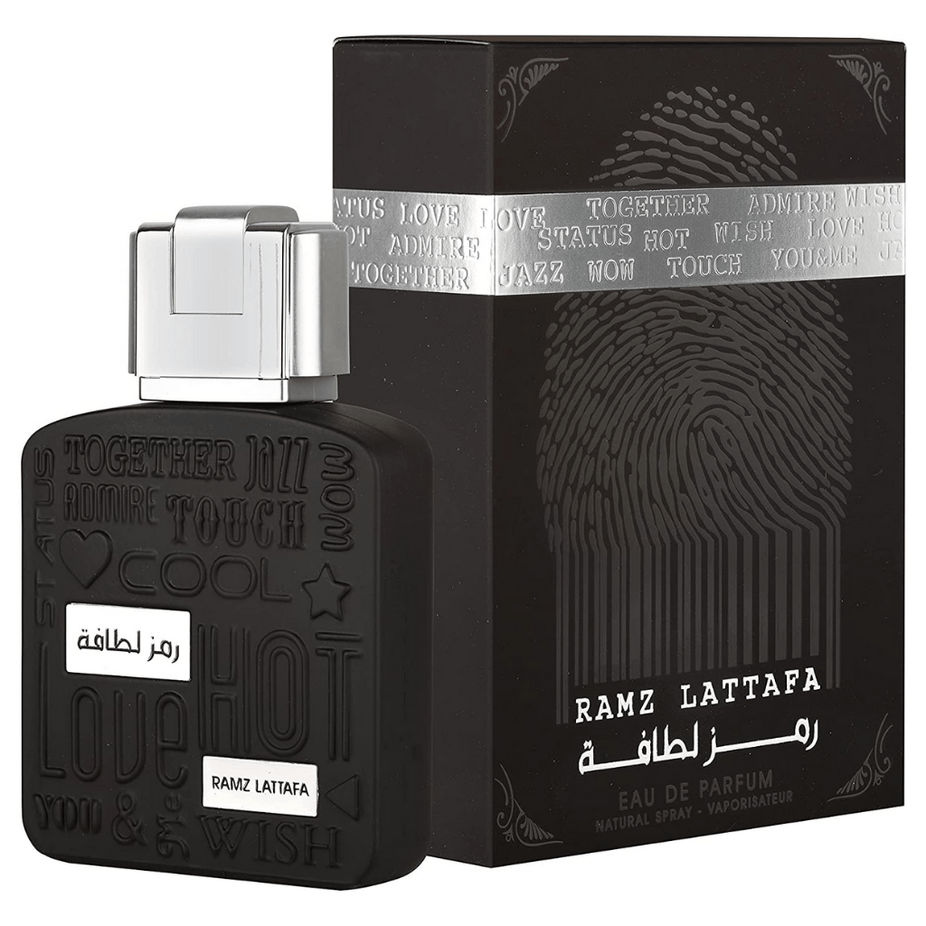 Lattafa Ramz Lattafa Silver Eau de Parfum spray 100ml bottle with sleek silver packaging and elegant design.