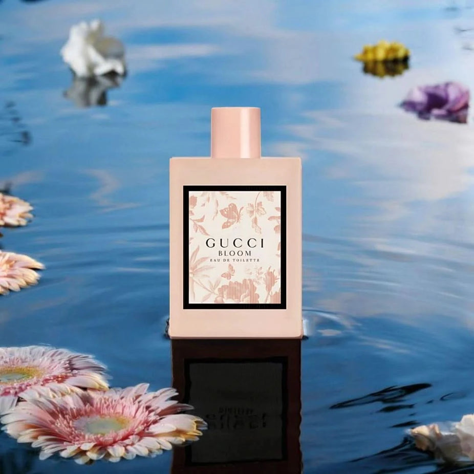 Gucci Bloom Eau de Toilette spray bottle, 100ml, with floral design and elegant packaging, for women.
