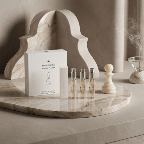Check Please Travel Trio by Mind Games, set of three 7.5ml bottles, featuring collection of travel-sized items in clear containers.
