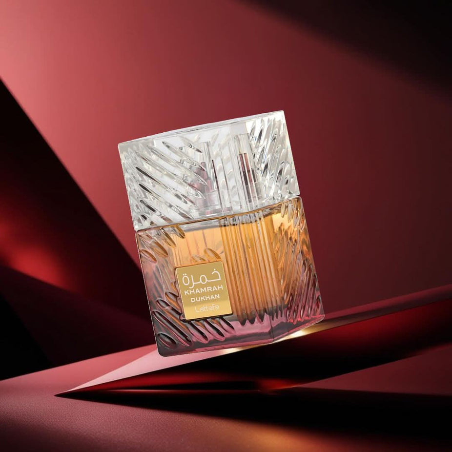 Lattafa Khamrah Dukhan Eau de Parfum spray 100ml bottle with elegant packaging, showcasing the luxurious fragrance design.