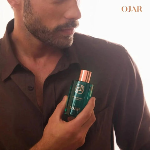 Ojar Wood Whisper Eau De Parfum 100ml bottle with sleek design and elegant label, showcasing the fragrance's sophisticated packaging.