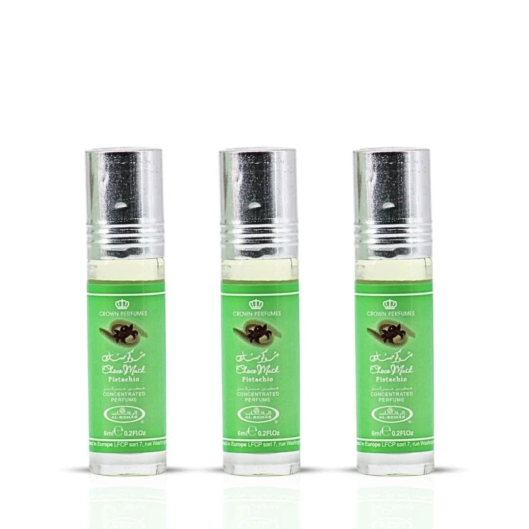 Bundle of three 6ml Al Rehab Choco Musk Pistachio perfume oils in clear bottles with black caps.