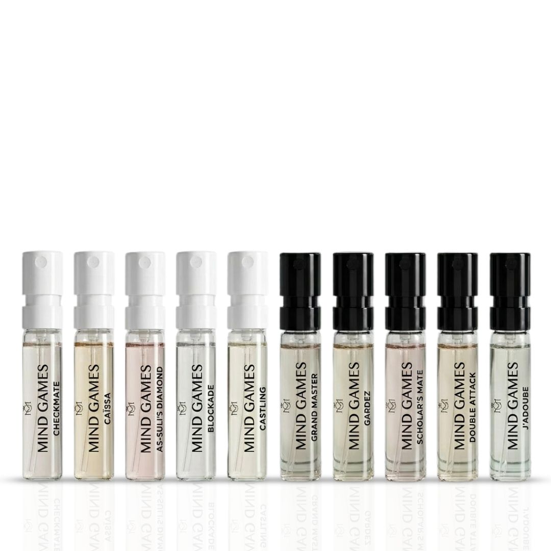 Mind Games Artisan Collection 10-piece sample discovery set with 2ml vials, featuring a variety of scents in small, colorful bottles.