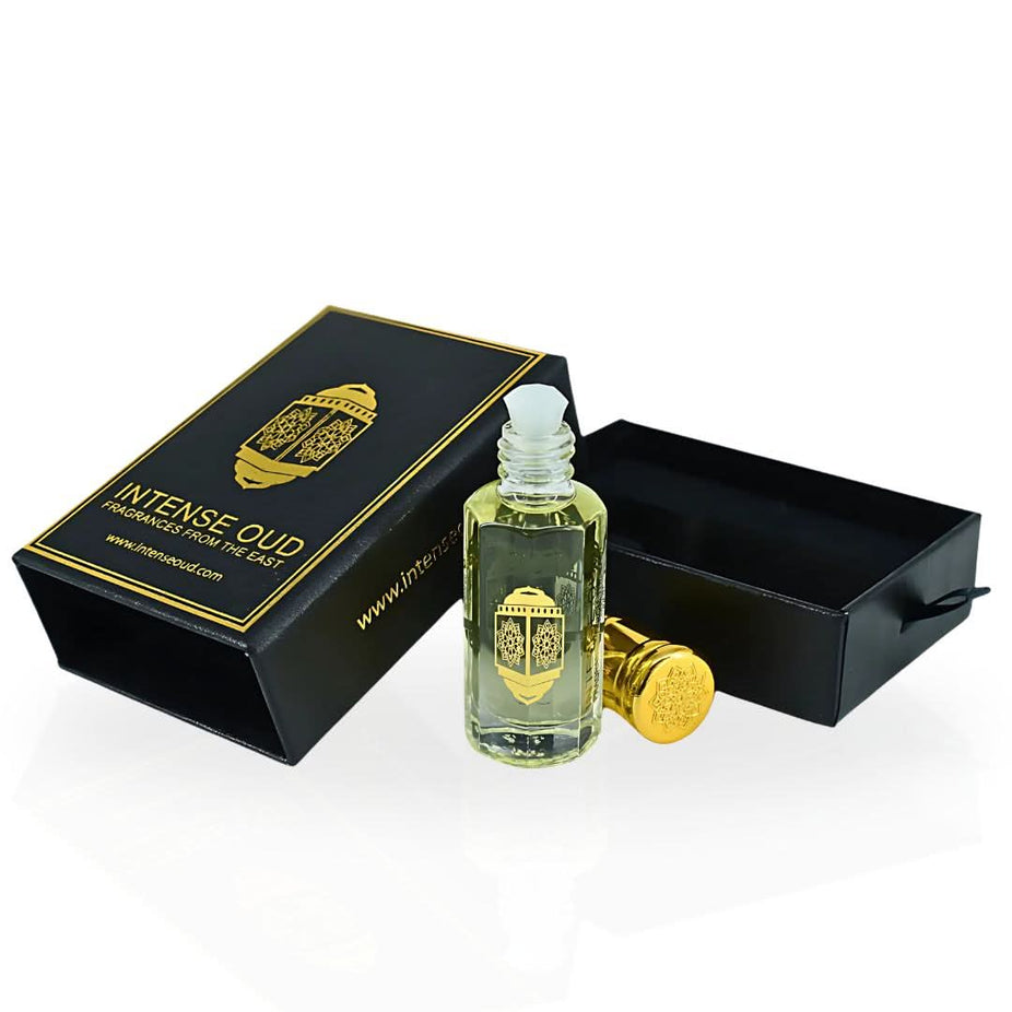 Amber Rose perfume oil by Intense Oud in a 12ml glass bottle, displayed with a sleek black gift box.