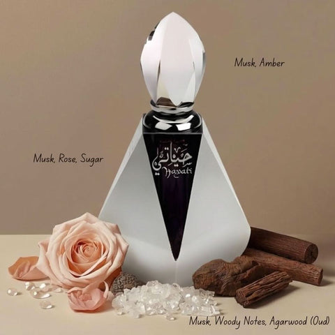 Al Haramain Hayati concentrated perfume oil set with four 3ml bottles and three refillable 3ml bottles, elegant packaging.