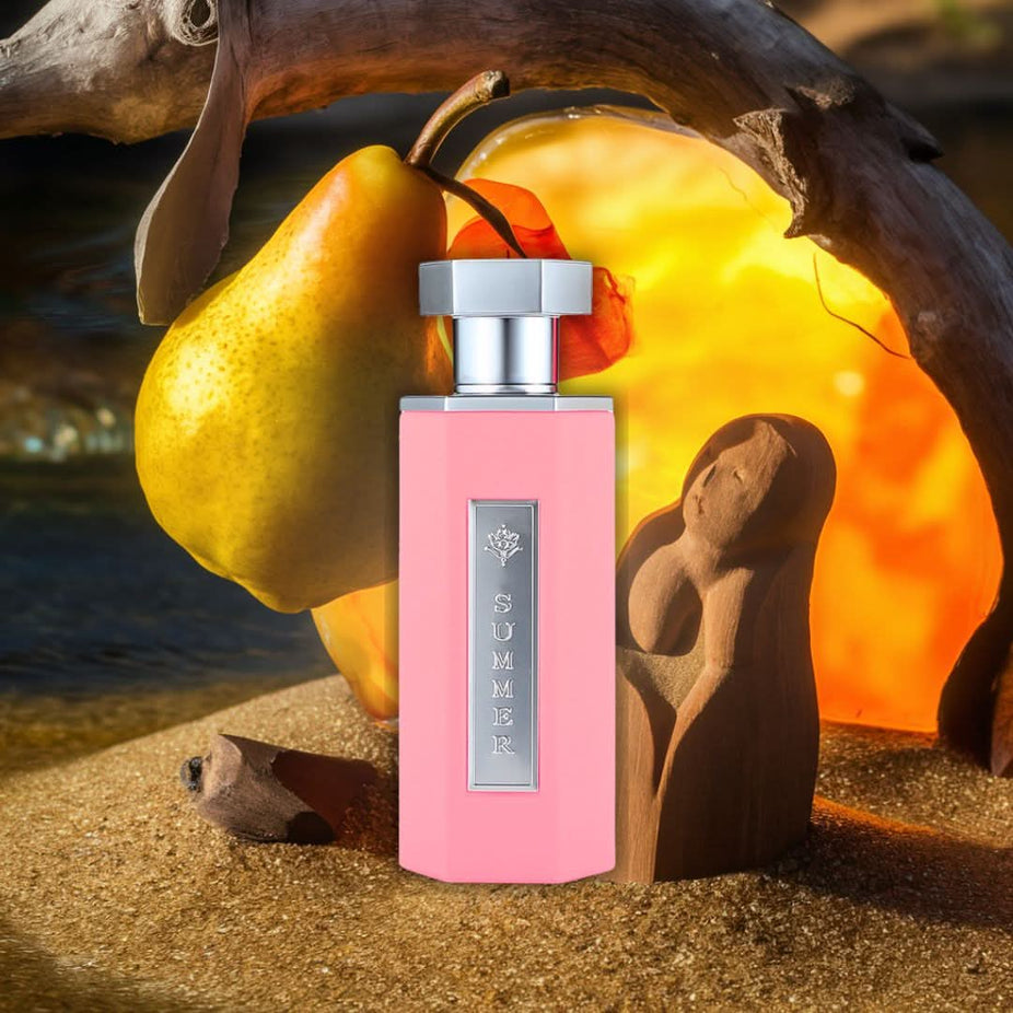 Summer Pink EDP by Reef Perfumes, 100ml, with a sleek perfume bottle showcasing a vibrant pink liquid and elegant design.