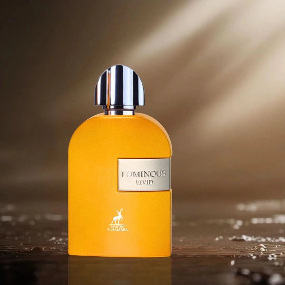 Maison Alhambra Luminous Vivid Eau de Parfum spray 100ml bottle with elegant packaging, showcasing a luxurious fragrance.