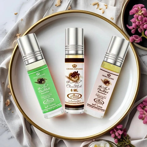 Al Rehab Choco Musk perfume oil bundle with marshmallow and pistachio scents, 6ml bottles, featuring decorative caps and labels.