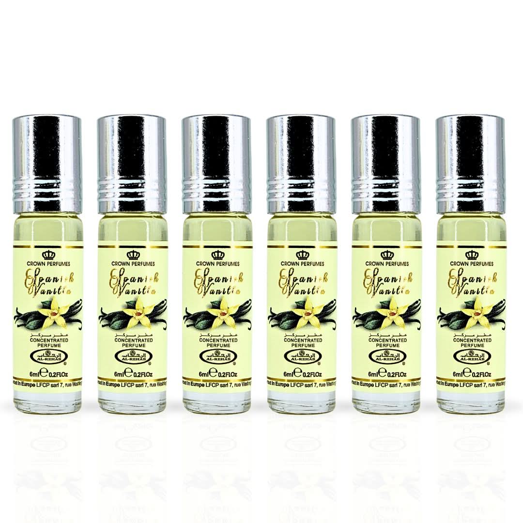 Six 6ml bottles of Al Rehab Spanish Vanilla Perfume Oil, concentrated CPO with vanilla scent in clear glass bottles.