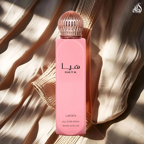 Lattafa Haya Eau de Parfum and All Over Spray bundle, featuring 100ml perfume bottle and 150ml spray, with elegant packaging.
