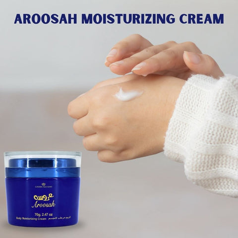 Aroosah Body Moisturizing Cream by Al Rehab in 70g jar, soft cream texture for nourishing skin, displayed in open jar.