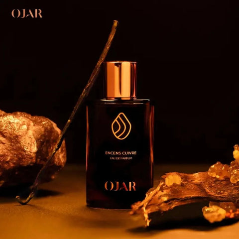 Ojar Encens Cuivre Eau De Parfum 100ml bottle with elegant metallic design, showcasing the luxurious fragrance packaging.