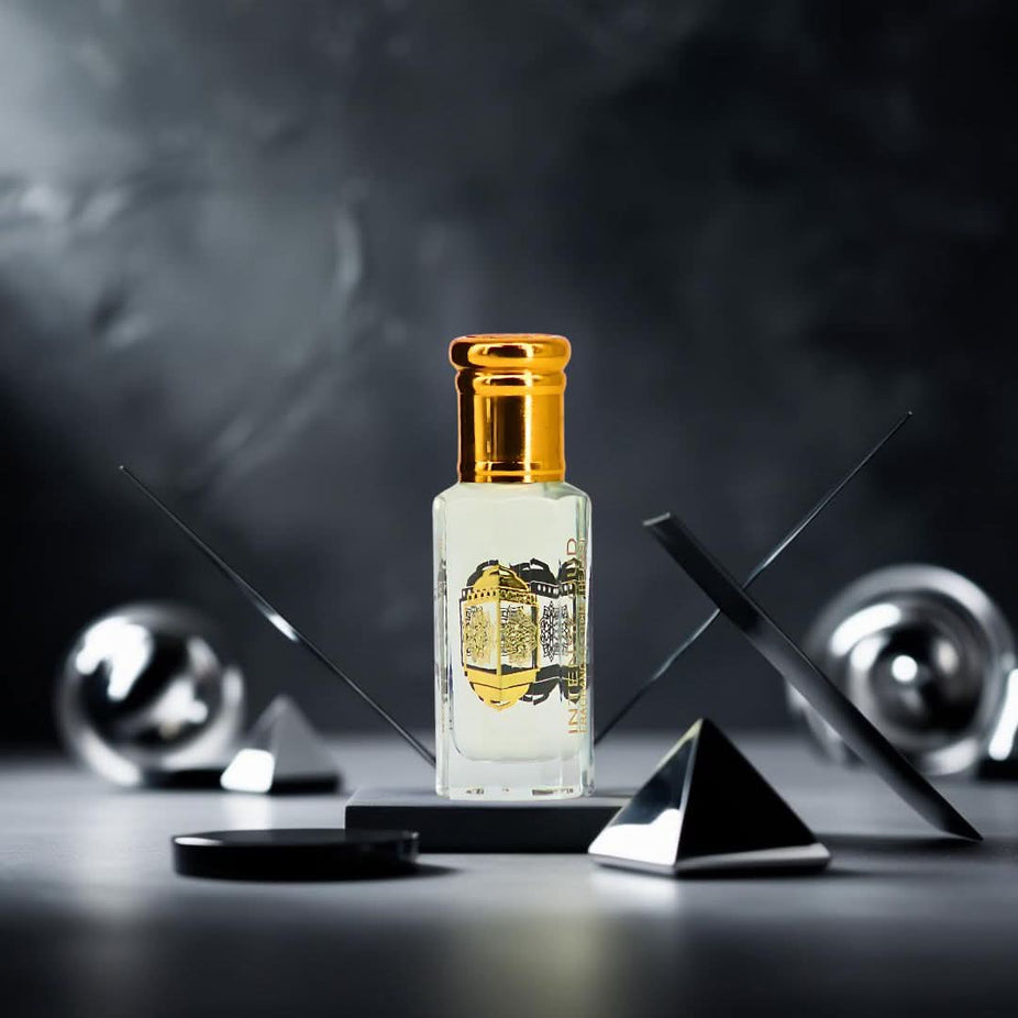 Intense Oud Inaya Perfume Oil 12ml with black gift box, featuring a sleek loose oil bottle and elegant packaging.