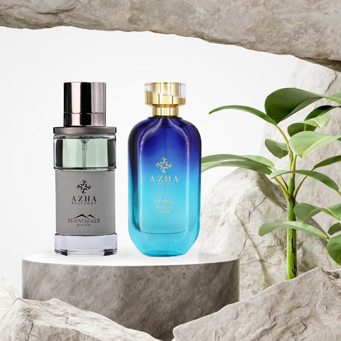 Azha Mountaineer for Him and Eternal Nights for Her 100ml perfume spray bundle, featuring elegant glass bottles with floral and mountain designs.