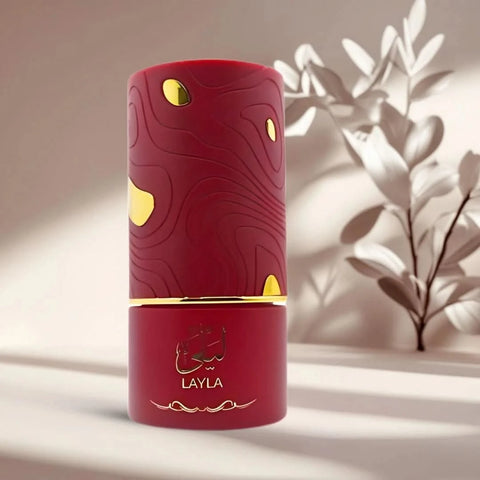 Al Absar Layla Eau de Parfum Spray 100ml bottle shown with elegant packaging and floral accents.