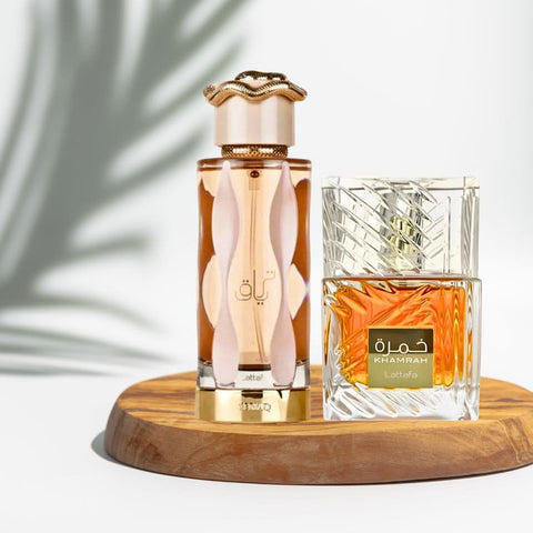 Lattafa Khamrah & Teriaq Eau de Parfum sprays in a bundle, featuring sleek bottles with elegant caps and vibrant labels.