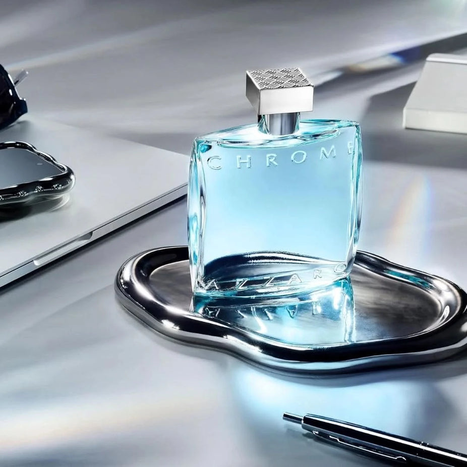 Azzaro Chrome Eau de Toilette spray bottle, 100ml (3.4 oz), with sleek chrome finish and minimalist design.