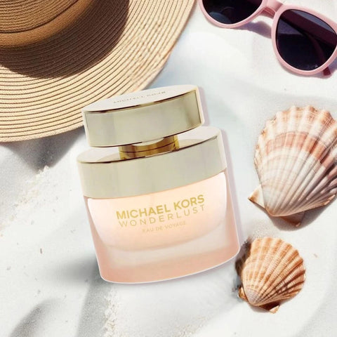 Michael Kors Wonderlust Eau de Voyage Eau de Parfum spray bottle, 50ml, with sleek design and elegant packaging.