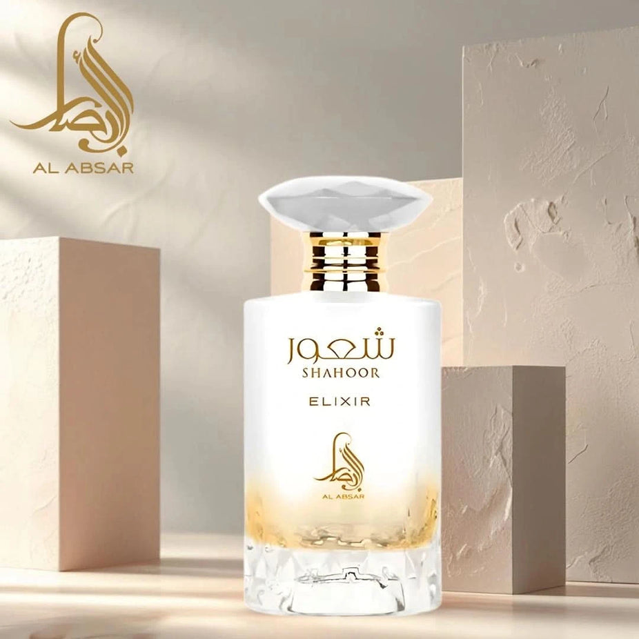 Shahoor Elixir Eau de Parfum spray by Al Absar, 100ml bottle, with elegant packaging and fragrance details visible.