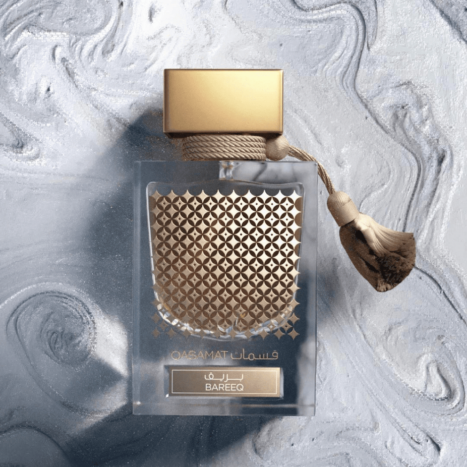Rasasi Qasamat Bareeq EDP 65ML Eau de Parfum bottle with elegant design and fragrance details.