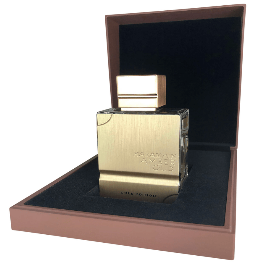 Al Haramain Amber Oud Gold Edition Eau de Parfum spray bottle with gold accents, 60ml, showcasing the luxurious fragrance packaging.