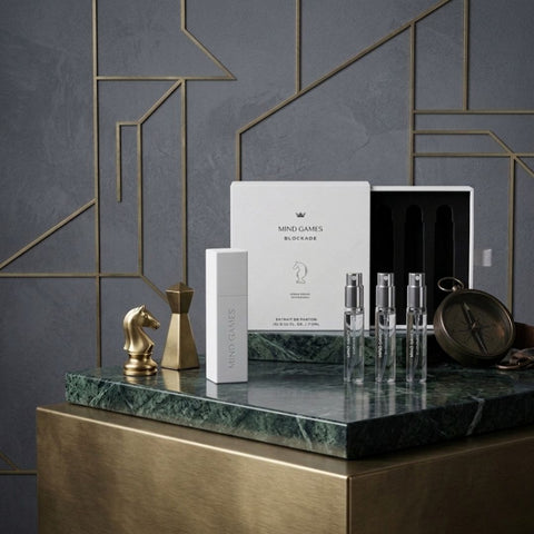 Mind Games Blockade Travel Trio includes three 7.5ml bottles of collection perfume in a compact, portable set.