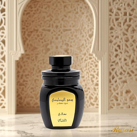 Rasasi Somow Al Rasasi Ma’ali Oudh Moattar Bakhoor 50g in a decorative jar with traditional design elements.