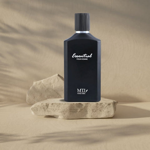 MTJ Essential Pour Homme EDP spray bottle, 100ML, with a sleek design, representing a long-lasting, spicy, citrusy, leathery masculine scent.