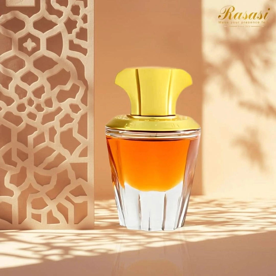 Rasasi Zakerat Al Sharq Kunooz concentrated perfume oil 20ml bottle with elegant packaging and gold accents.