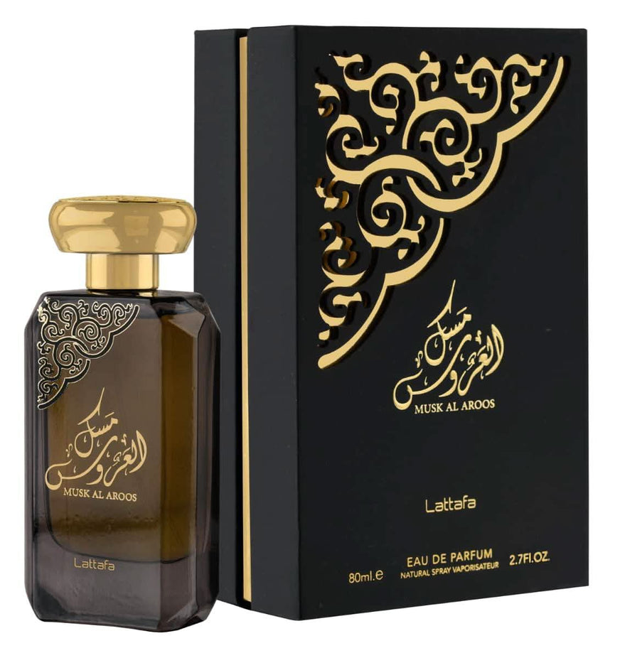 Lattafa Musk Al Aroos and Fakhar Men & Ser Al Hubee EDP perfume gift set with magnetic box, featuring elegant fragrance bottles.