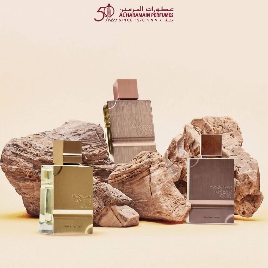 Al Haramain Amber Oud Gold and Tobacco Edition EDP bottles, 60ml Eau De Parfum with luxurious scent details.