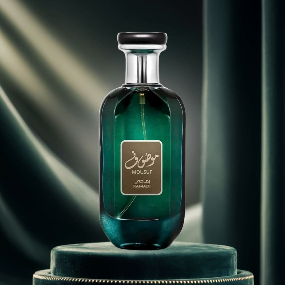 Mousuf Ramadi Eau De Parfum spray by Ard Al Zaafaran, 100ML bottle with green and floral design, long-lasting refreshing scent.