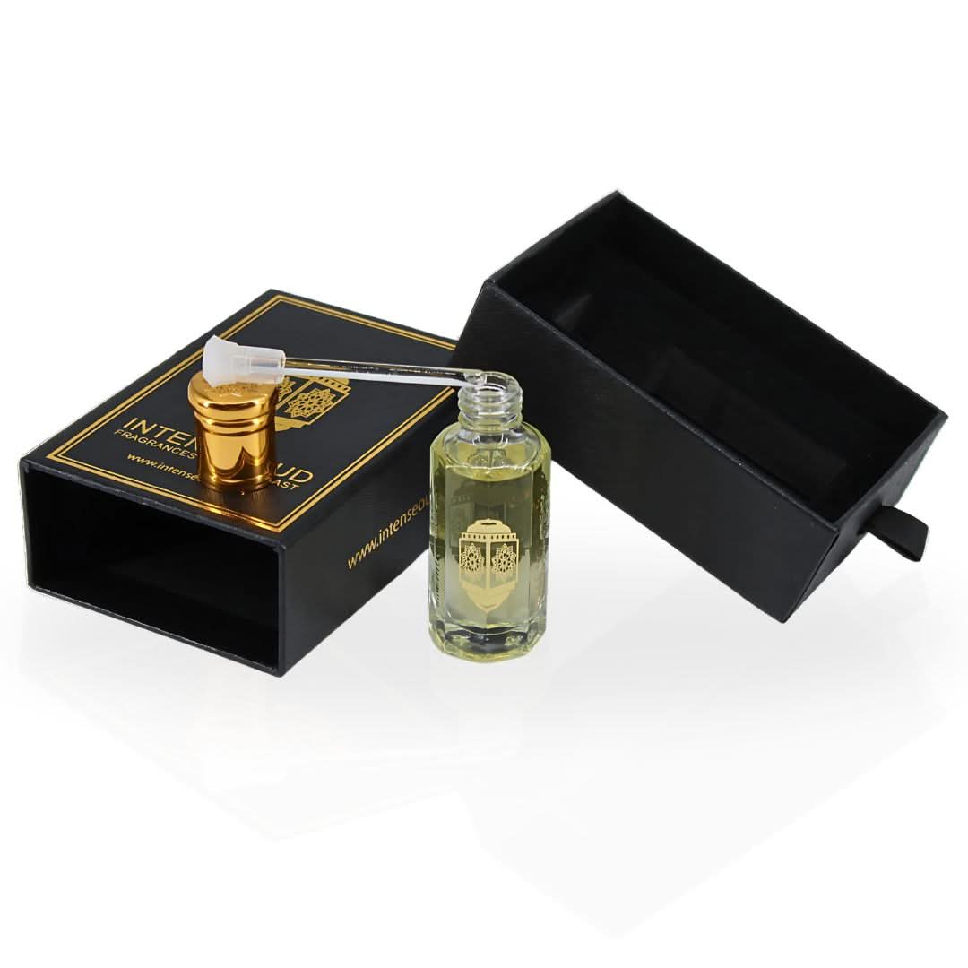 Intense Oud Warda perfume oil in 12ml bottle with black gift box, featuring a clear glass container and elegant packaging.