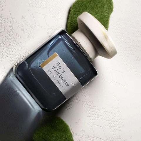 Bois d'Ambrette Eau de Parfum spray by Atelier Materi, 100ml, featuring elegant perfume bottle with a sleek design.