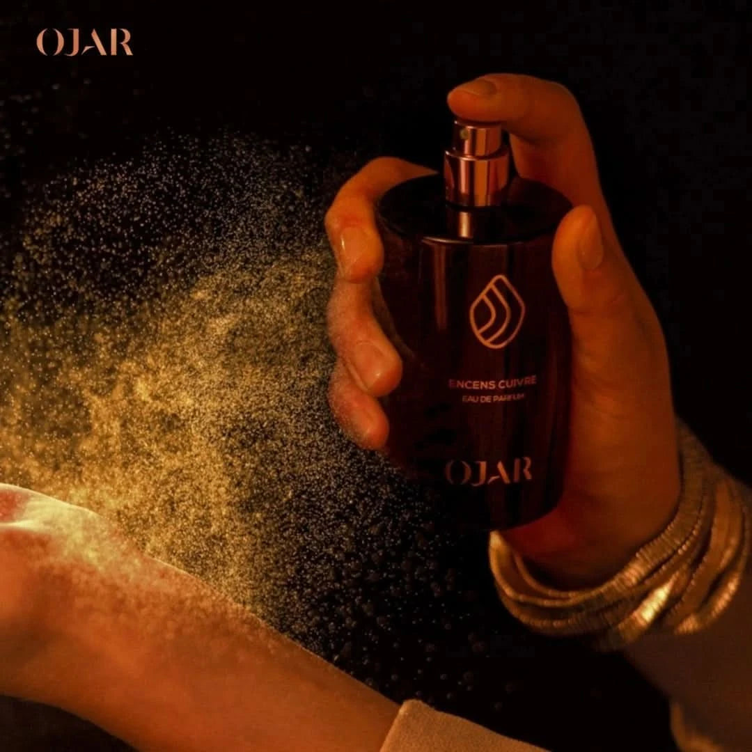 Ojar Encens Cuivre Eau De Parfum 100ml bottle with a sleek design and metallic copper accents.