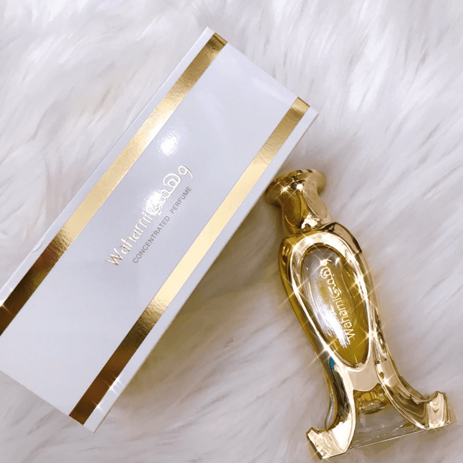 Wahami Perfume Oil by Rasasi, 20 ML concentrated perfume oil in a clear glass bottle with a black cap.